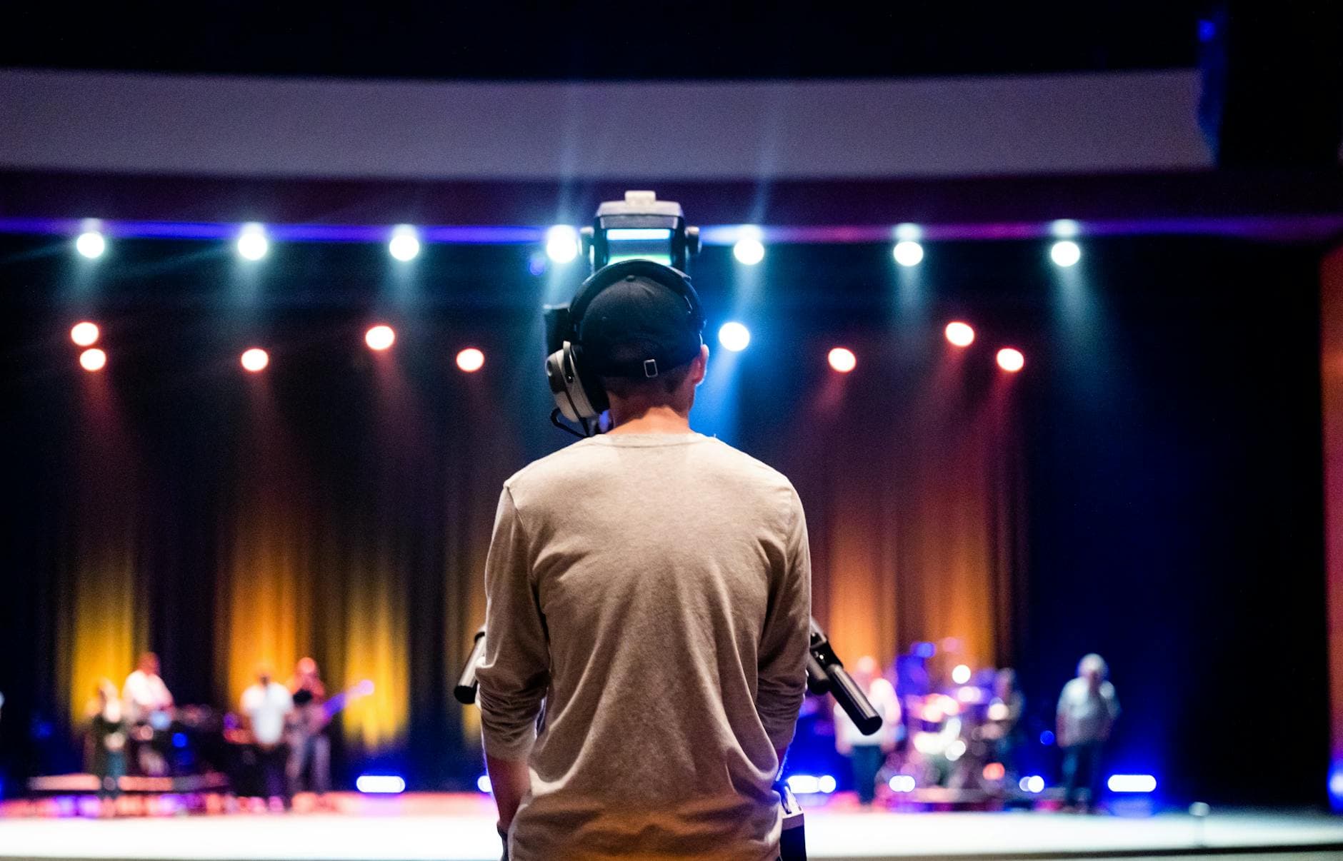 Front-of-house operator watching a live show